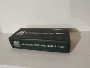 lot 104 image: NcSTAR AR-15 Handguard Rail Bipod