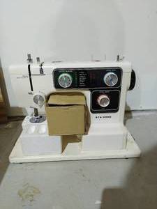 lot 145 image: New Home Sewing Machine