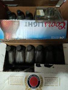 lot 407 image: Two Boxes Of Harley Oil