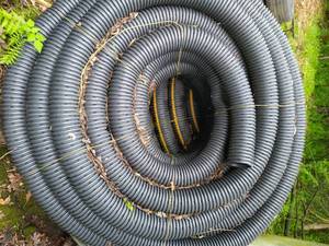 lot 428 image: Two Large Rolls Of Drain tile