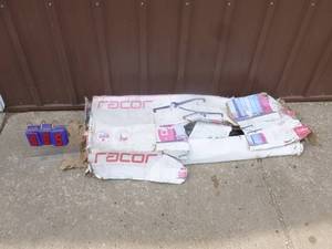 Racor garage lift. Box damaged in shipment. Appears winch is missing. As shown.