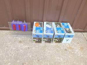 Qty of 4 solar powered color changing lights with remotes. Untested. As shown.