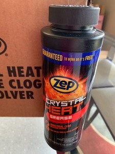 lot 76 image: Nine New Bottles of ZEP Crystal Heat Grease Clog Dissolver