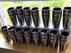lot 75 image: 22 New Stainless Coffee Mugs Branded with Bosch
