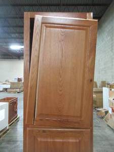 lot 336 image: Hampton Bay Hampton Assembled 18x84x24 in. Pantry Kitchen Cabinet in Medium Oak KP1884-MO