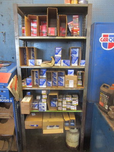 lot 399 image: STEEL SHELF WITH NEW OIL FILTERS