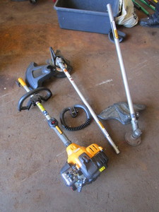 lot 418 image: CUB CADET STRING TRIMMER  BRUSH CUTTER WITH ATTACHMENTS
