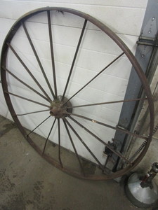 lot 450 image: ANTIQUE STEEL TRACTOR WHEEL
