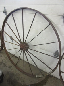 lot 451 image: ANTIQUE STEEL TRACTOR WHEEL