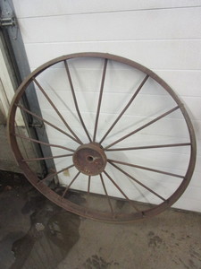 lot 452 image: ANTIQUE STEEL TRACTOR WHEEL
