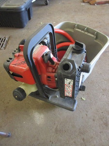 lot 489 image: HOMELITE PUMP WITH HOSE