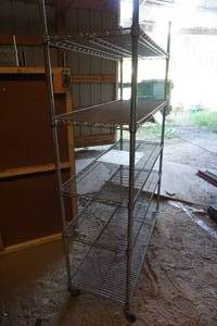 lot 70 image: Metal Wheeled Adjustable Shelving Unit