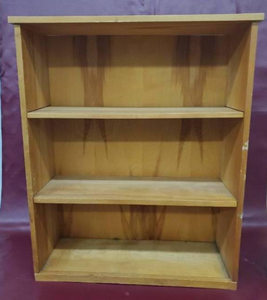 lot 35 image: bookshelf and bag of vehicle items