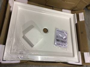 lot 12 image: SlimLine 34 in. D x 42 in. W x 2 34 in. H Center Drain Single Threshold Shower (customer return) (see pictures) 