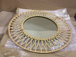 lot 34 image: Medium Round Brown Modern Accent Mirror with Polyrattan Braiding (24 in. Diameter)(customer return) (see pictures) 