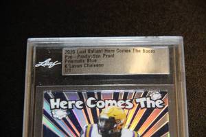 lot 20 image: 2020 Leaf Valiant Here Comes The Boom KLavon Chaisson Encased 11 Rookie Card