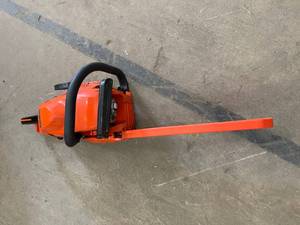 Gas 2-Stroke Cycle Chainsaw by ECHO- used in working conditions