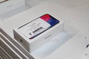 lot 317 image: Apple iPhone X Cell Phone A1901 Space Gray 64GB (new in unopened box)