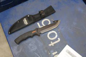 lot 385 image: Camillus Titanium Knife 9-34L  with Sheath