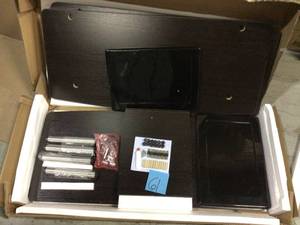 lot 61 image: Designs2Go 36 in. Espresso Particle Board TV Stand 36 in. with Doors (customer return) (see pictures) 