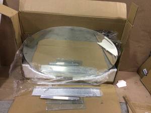 lot 74 image: 24 in. x 36 in. Recessed or Surface-Mount Oval Bathroom Medicine Cabinet with Oval Beveled Mirror by Pegasus (customer return) (see pictures) 