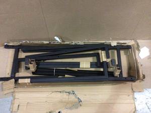 lot 75 image: 8 ft. D x 3 ft. H x 1 ft. W Firewood Rack with Black Powder-Coated Finish and 2-Way Adjustable Polyester Cover by ShelterLogic (customer return) (see pictures) 