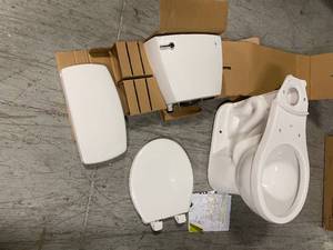 Delta Foundations 2-piece 1.28 GPF Single Flush Round Front Toilet in White not used see pictures