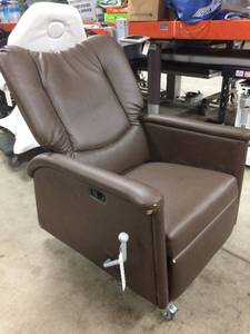 lot 35 image: Super Cushy Oversized Extra Wide Medical Recliner On Wheels - Has Wear & Tear To Upholstery But Still Very Comfortable & Rocks Too
