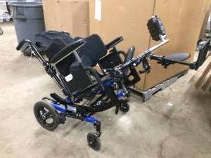 lot 38 image: MSRP $2500 Quickie IRIS TILT IN SPACE Wheelchair - NICE CONDITION - NO SEAT CUSHION - TREAD ON WHEELS ARE WORN