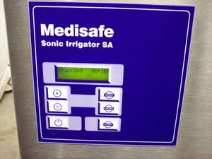 lot 34 image: MSRP $8000 Medisafe Sonic Irrigator SA Semi-Automatic Ultrasonic Cleaner&nbspDisinfection CounterTop SISA System On Mobile Stand 2 Door Cabinet With Owners Manual Service Manual, Baskets & More Great Working Condition