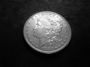 lot 12 image: 1882 S Morgan Silver Dollar