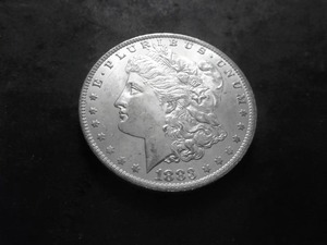 lot 13 image: 1883 O Morgan Silver Dollar