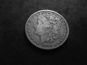 lot 20 image: 1886 O Morgan Silver Dollar