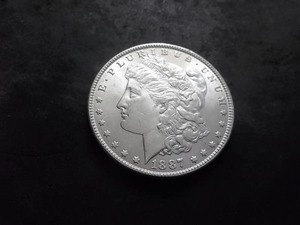 lot 21 image: 1887  Morgan Silver Dollar