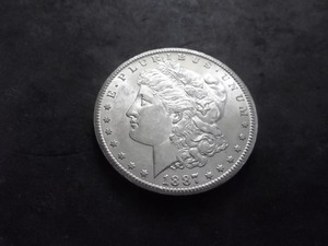 lot 22 image: 1887 S Morgan Silver Dollar