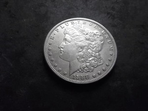 lot 24 image: 1888 S Morgan Silver Dollar