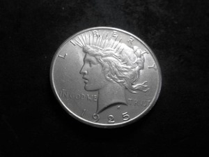 lot 57 image: 1925 Peace Silver Dollar