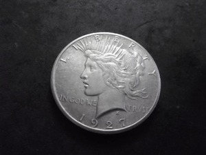 lot 62 image: 1927 Peace Silver Dollar