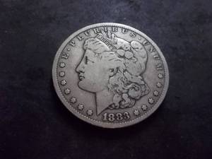 lot 14 image: 1883 CC Morgan Silver Dollar
