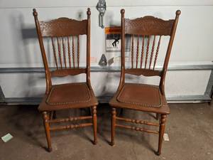lot 117 image: Two Antique Solid Wood Dining Chairs with Embossed Leather Seats
