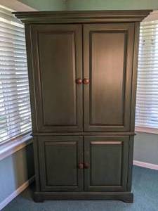 lot 5 image: Green Wood Entertainment Center Armoire