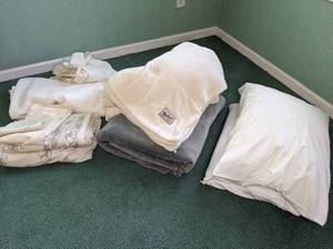 lot 60 image: Bedding Woolrich Blanket, Pillows, Bedskirt, Mattress Pad, Sheets