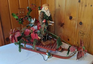 lot 47 image: Decorative Wood Sleigh & Santa Decor