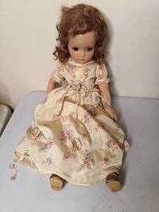 lot 24 image: Antique Doll in Long Floral Dress