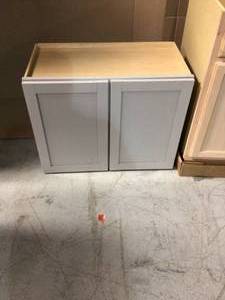 lot of 3 Hampton Bay Cabinets (all different colors and sizes) (see all pictures)
