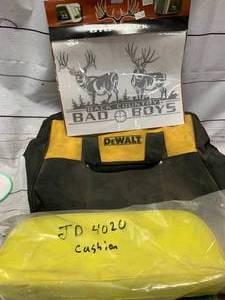 lot 60 image: John Deere 4020 Cushion, DeWalt Tool Bag, Buck Decal