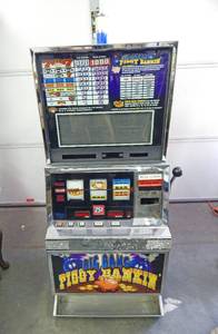 lot 1 image: Vintage 1995 Williams Model 400 Big Bang Piggy Bankin Slot Machine