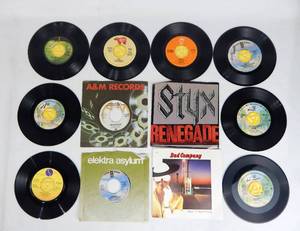 lot 175 image: Set of 12 Vintage 1970s Rock and Comedy 45 Records