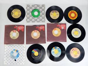 lot 176 image: Lot of 12 Vintage Rock and Pop 45 Records
