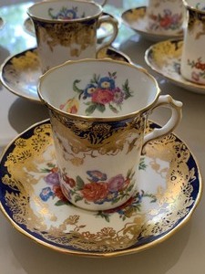Set of Seven Demitasse CupsSaucers